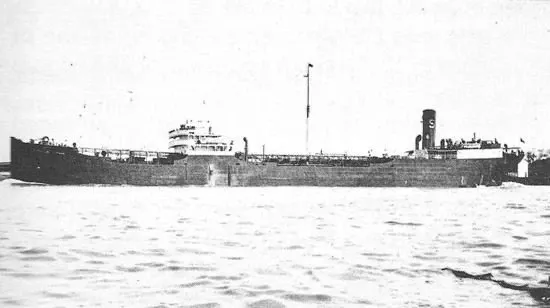 Historic black-and-white photograph of the SS Joseph M. Cudahy, a 430-foot World War II-era steam tanker, seen broadside...